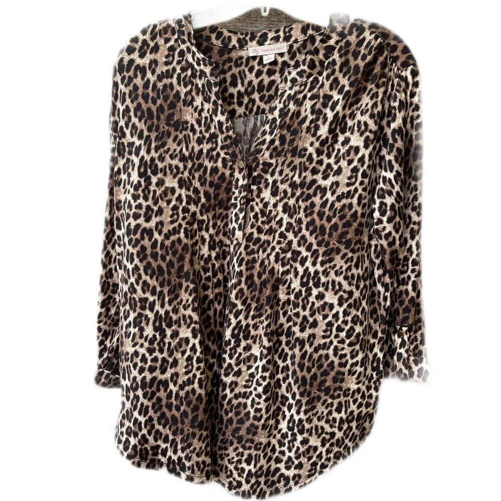 CB established in 1962 size Large cheetah print tunic